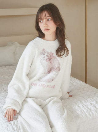 Woman wearing Baby Moco CAT JQD Pullover Sweater, featuring fluffy texture and Siberian cat design with ribbon, in a cozy setting.