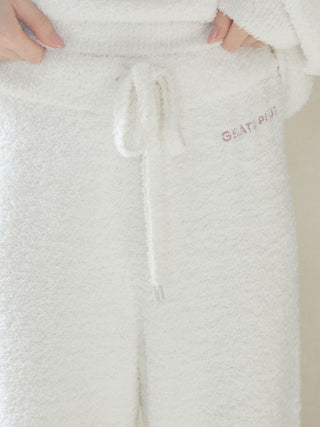 Close-up of Baby Moco Cat Long Lounge Pants in soft white fabric with drawstring, showcasing premium loungewear by Gelato Pique USA.