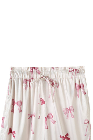Close-up of pink ribbon print long pants with drawstring waist, part of the Ribbon Shirt & Long Pants Set, featuring a feminine design.