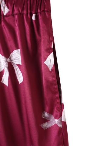 Close-up of the pink ribbon print on the silky-soft long pants from the Ribbon Shirt & Long Pants Set, showcasing elegant design details.