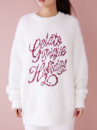 Woman wearing white Feather Pullover Sweater, festive and cozy with holiday-themed embroidery, perfect for casual elegance.