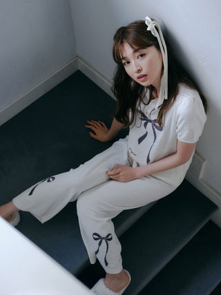 Model wearing Gelato Pique USA Ribbon Jacquard Pullover Sweater with puff sleeves, featuring premium loungewear in off-white.