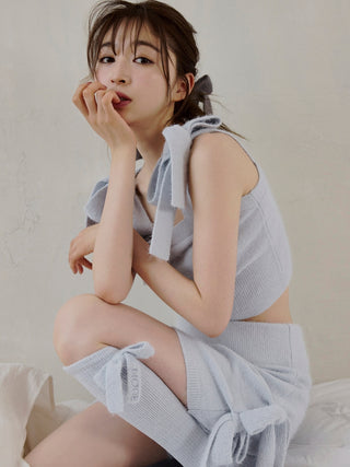 Model wearing Gelato Pique Ribbon Lounge Shorts with ribbon accents, showcasing a relaxed fit and cozy plush fabric.