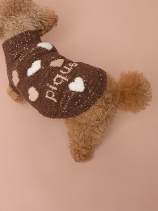 Dog wearing a brown Baby Moco Heart Pattern Pet Pullover with white and beige heart designs.