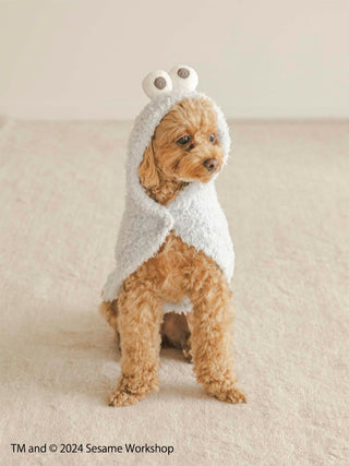 Cute dog wearing a Cookie Monster cape from Sesame Street collection for cats and dogs.