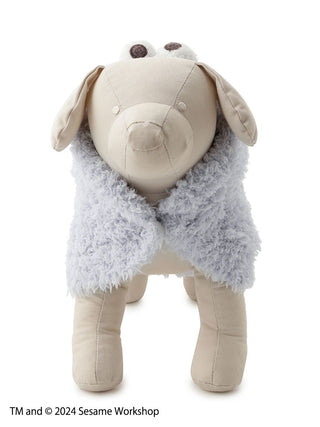 Cookie Monster-themed cape for cats and dogs displayed on a plush toy. Cozy and stylish pet accessory from Sesame Street collection.