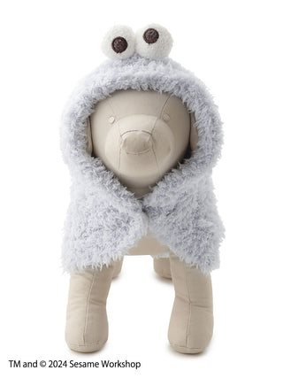 Plush dog mannequin wearing a fluffy Cookie Monster cape from Sesame Street for pets.