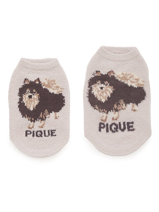 Pomeranian pet clothes by CAT&DOG with dog design on fabric.