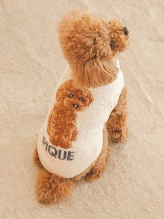 Toy Poodle wearing stylish CAT&DOG pet clothes with a plush design on the back, perfect for small dogs.