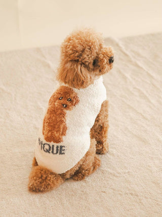 Toy Poodle wearing CAT&DOG unique pet clothes, featuring a soft, plush design with an adorable poodle pattern. Perfect for stylish pets.