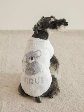 Dog wearing CAT&DOG Baby Moco Animal Pet Clothes with koala design, on a light carpeted floor.