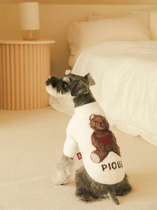 Schnauzer wearing CAT&DOG Heart Bear Jacquard pet clothes with embroidered bear design, sitting in a cozy room.