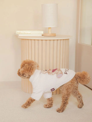 Small dog wearing CAT&DOG Heart Bear Jacquard Pet Clothes in a cozy room