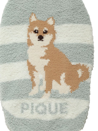 Shiba Inu design on green and cream pet mat from CAT&DOG. Perfect for pets, this cozy mat showcases a cute Shiba Inu. Text reads 'PIGUE'.