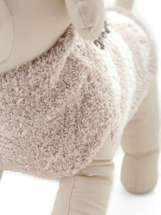 Close-up of CAT&DOG Baby Moco Chihuahua pet clothes in soft beige textured fabric.