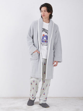 Model wearing KAZUSA MATSUYAMA Monster Pattern Lounge Pants and matching robe.