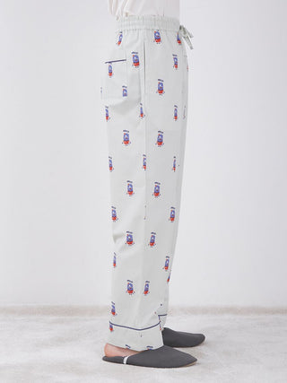 Side view of KAZUSA MATSUYAMA Monster Pattern Lounge Pants featuring unique monster design and relaxed fit.