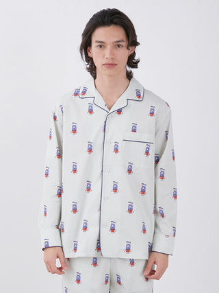 Model wearing KAZUSA MATSUYAMA Monster Pattern long sleeve sleep shirt, featuring hotel porter monster design, from Gelato Pique collection.