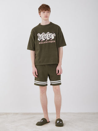 Model wearing KOUSUKE SHIMIZU Air Moco Lounge Shorts by GELATO PIQUE HOMME, featuring artistic design and lightweight comfort.