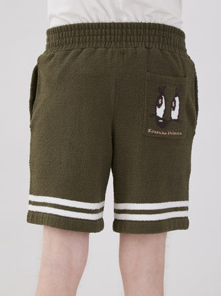 KOUSUKE SHIMIZU Air Moco Lounge Shorts in olive green with white stripes, featuring an artistic graphic on the pocket for men's loungewear.