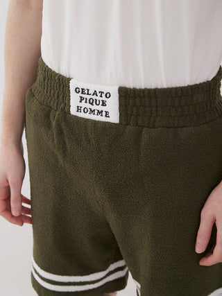 KOUSUKE SHIMIZU Air Moco Lounge Shorts in olive green for men by GELATO PIQUE HOMME, showcasing comfortable and stylish elastic waistband.