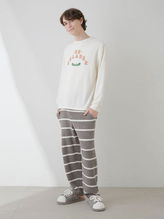 Model wearing Gelato Pique USA mens powder border lounge pants, ultra-soft and plush, in a stylish striped design with premium comfort.