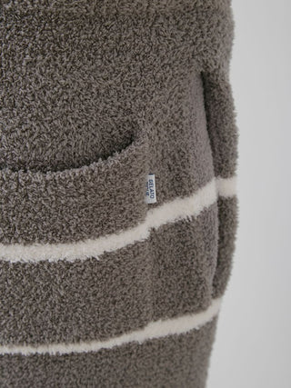 Close-up of Mens Powder Border Lounge Pants in grey with pocket detail, showcasing plush Powder fabric and stylish stripe design by Gelato Pique USA.