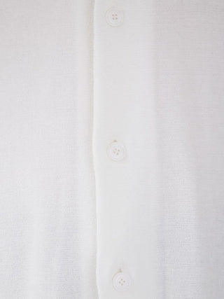 Close-up of Smoothie Lite Tennis Logo Lounge Shirt in white, showcasing button details and ultra-thin fabric for sporty chic style.