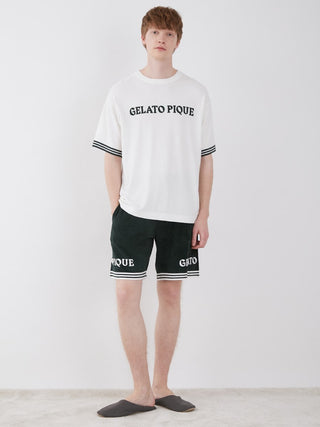 Men's Smoothie Lite Tennis Lounge Top by Gelato Pique featuring retro design with brand logos on sleeves.