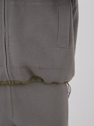 Close-up of Gelato Pique Plating Moco ECWCS Blouson Jacket's ribbed knit texture showcasing luxury and comfort.