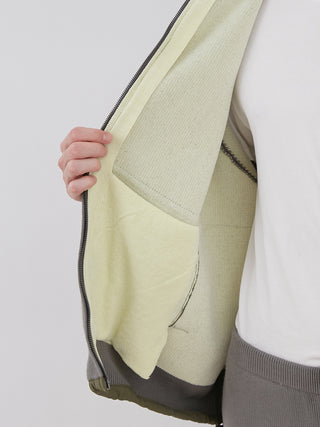 Interior view of OCEANS Plating Moco ECWCS Blouson Jacket by Gelato Pique, showing soft lining and ribbed knit design for men's comfort.