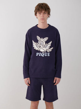 Model wearing navy KOUSUKE SHIMIZU Men's Air Moco Pullover Sweater with Pique design, showcasing cozy elegance and effortless fashion.