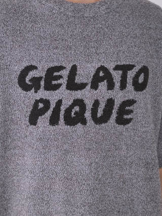 Close-up of Gelato Pique logo on Men's Melange Knit Shirt showcasing textured heathered knit design.