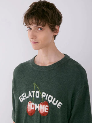 Model wearing Men's Smoothie Cherry Fleece Shirt by Gelato Pique, featuring cherry embroidery and Homme logo on ultra-soft fabric.