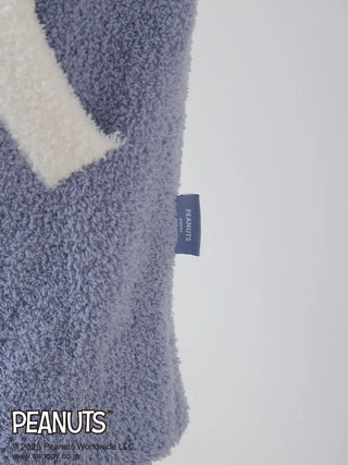 Close-up of PEANUTS Olaf Babymoco cardigan texture, showcasing the soft, fluffy fabric with a small tag visible.