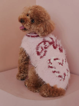 Brown dog wearing CAT&DOG Feather Pullover with candy cane jacquard design, perfect for winter warmth and holiday cheer.