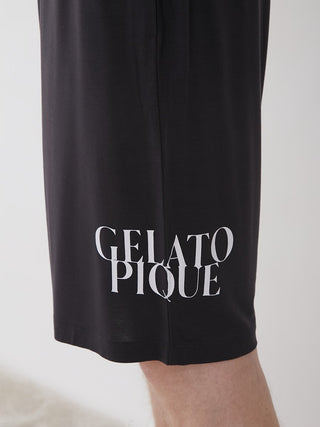Close-up of black lounge shorts with 'Gelato Pique' branding, highlighting the smooth rayon-blend fabric for ultimate comfort.