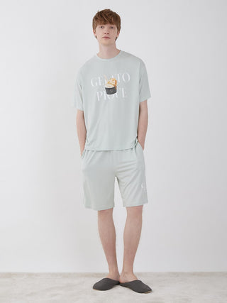 Model wearing Men's COOL Rayon Comfy Lounge Shorts in light gray, showcasing comfortable loungewear for ultimate style and relaxation.