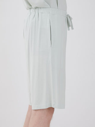 Side view of Men's COOL Rayon Comfy Lounge Shorts in light beige, showcasing smooth rayon-blend fabric and relaxed fit.