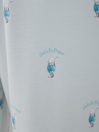 Close-up of Gelato Pique Men's Cream Soda Lounge Shorts fabric in light blue with cream soda pattern.