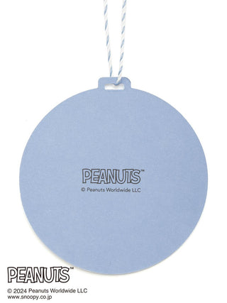 Blue round Peanuts tag with logo and copyright details on a string.