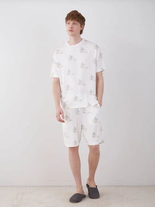 Model wearing COOL MEN'S Polar Bear Motif Lounge Shorts, featuring a playful polar bear ice cream print, paired with matching top.
