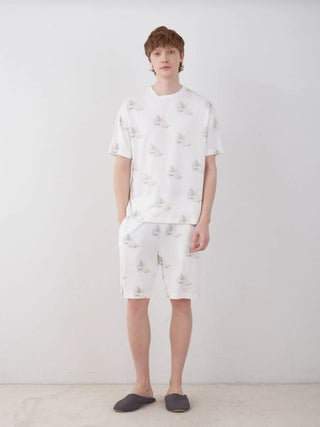 Model wearing COOL MEN'S Polar Bear Motif Lounge Shorts by Gelato Pique, featuring playful polar bear ice cream pattern, in white.