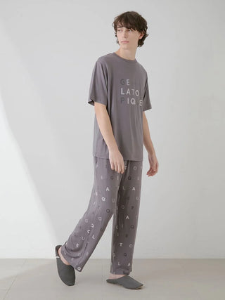 Man wearing Gelato Pique USA rayon logo motif lounge pants, premium loungewear and sleepwear with stylish cooling design.