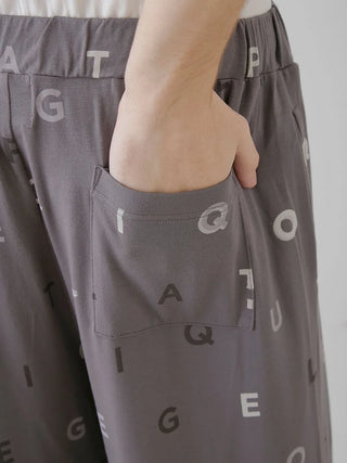 Close-up of Gelato Pique USA rayon lounge pants with logo motif, featuring a side pocket. Premium loungewear and sleepwear.