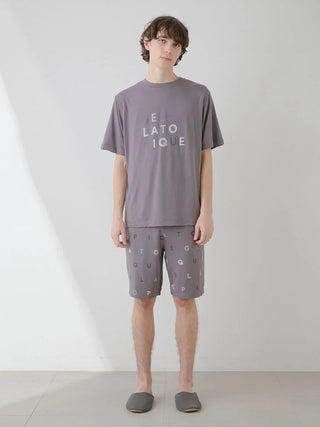 Model wearing Gelato Pique USA's Rayon Logo Motif Men's Lounge Shorts, premium loungewear with stylish brand logo pattern.