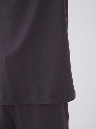Detail of men's rayon logo sleepwear t-shirt showcasing smooth texture and eco-friendly fabric.