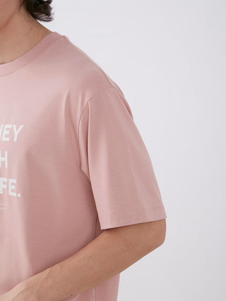 Close-up of Sarafree Logo Men's Loungewear Set in pink, featuring short sleeves and soft fabric for ultimate comfort and style.