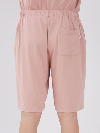 Back view of Sarafree Logo Men's Loungewear Shorts in pink, featuring a pocket and elastic waistband, ideal for comfort and style.
