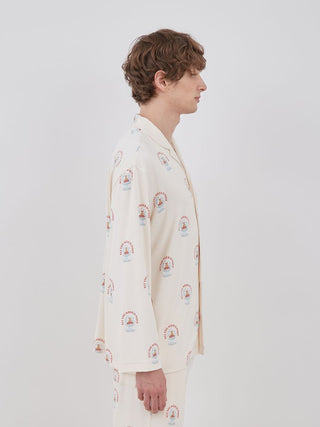 Side view of long sleeve sleep shirt with snow globe bear pattern, worn by a model, showcasing whimsical and cozy design.